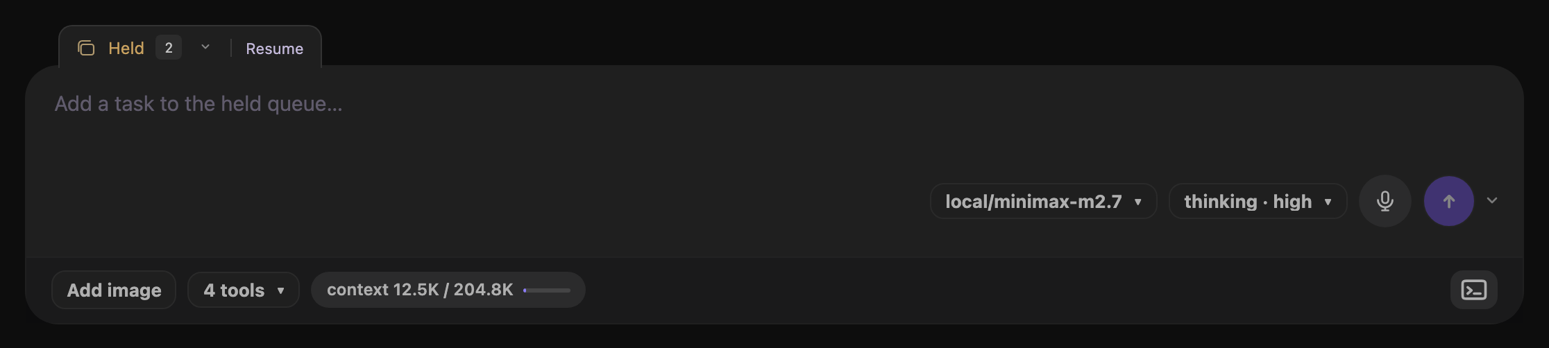 Closed Held queue tab with a task count and Resume attached to the composer